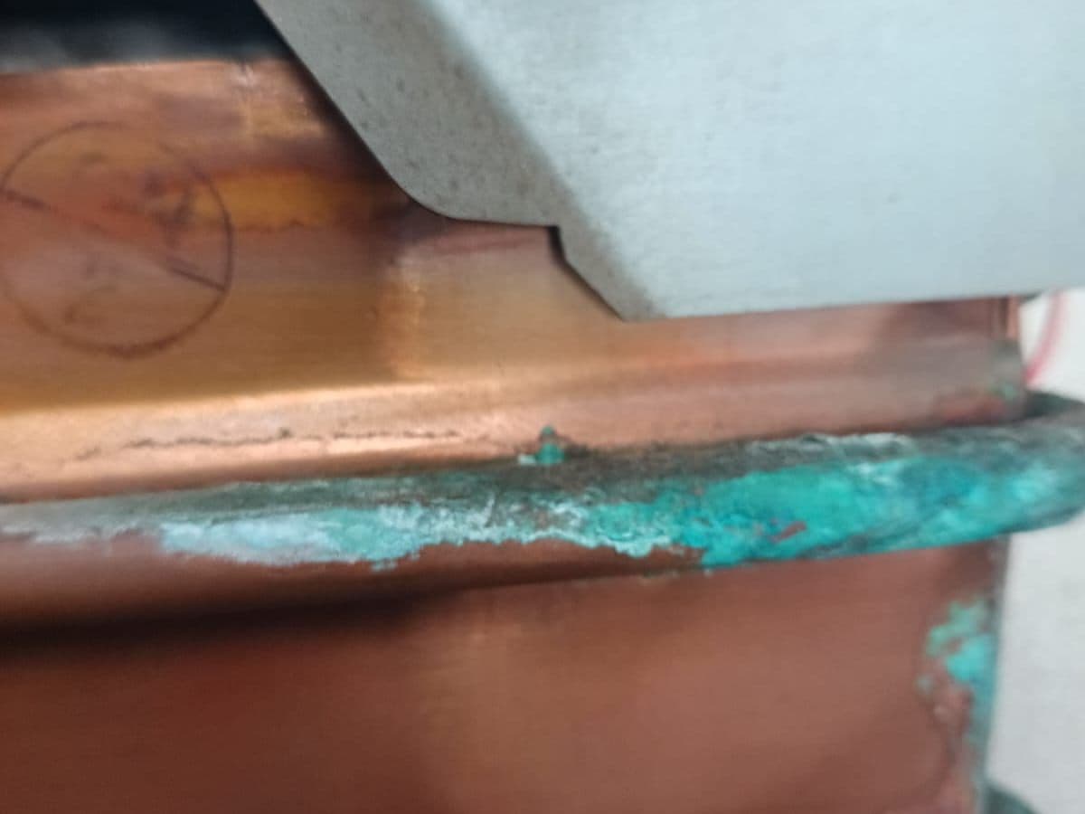 Intercambiador de calefont corroído reemplazado en Puente Alto